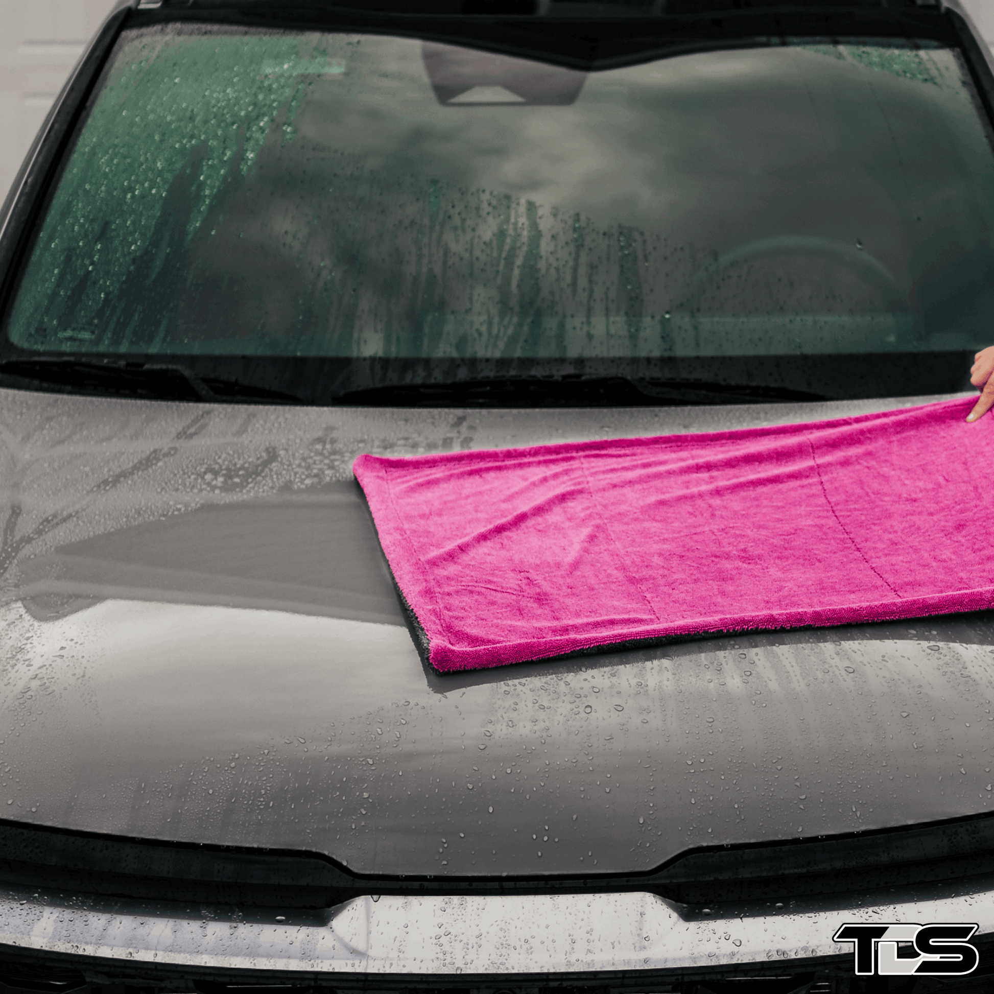 A Photo of thatdtailguy Drying the Outside of a Small SUV. The best Detailing in Evans and Grovetown Georgia.