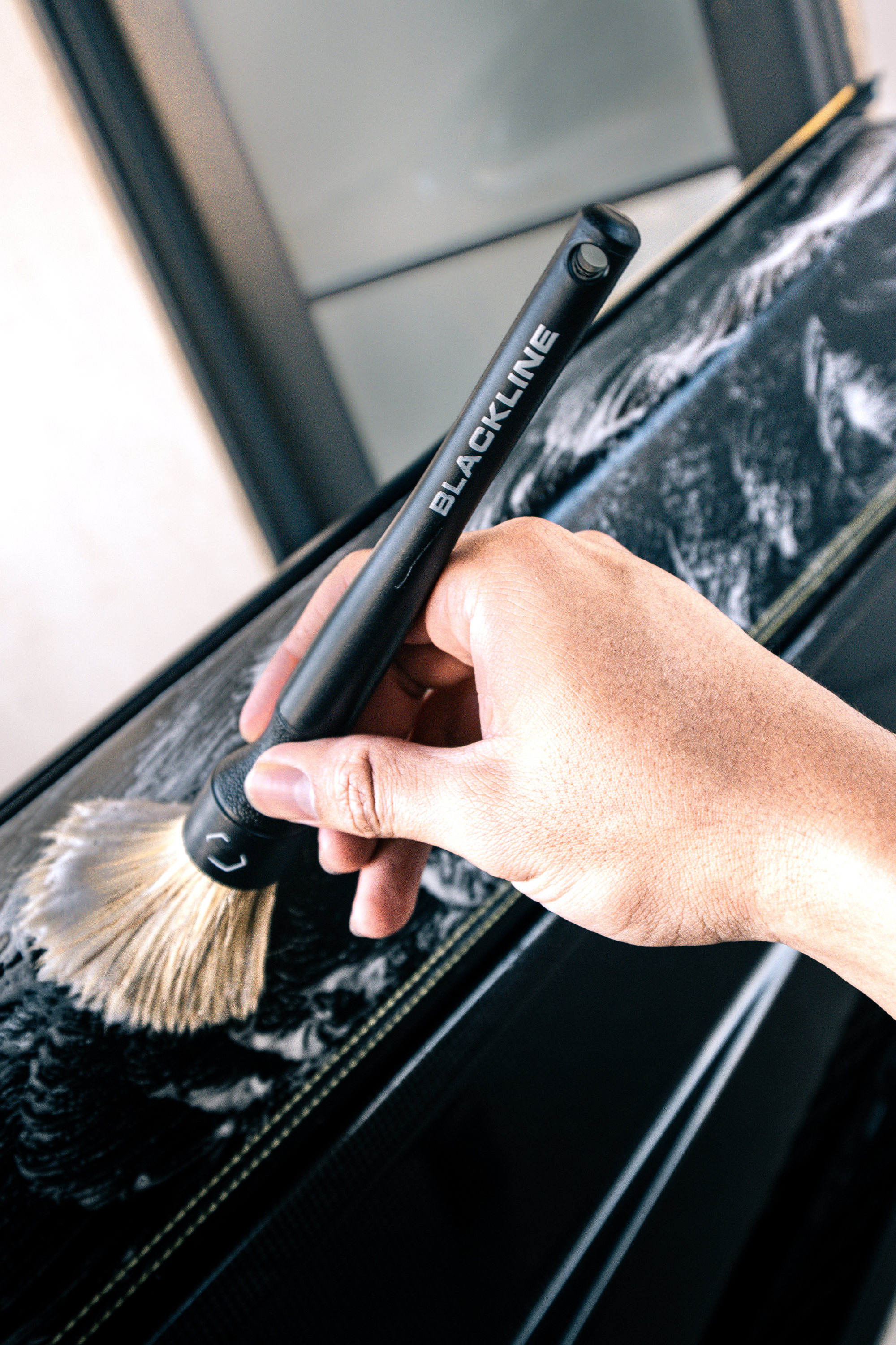 Blackline Car Care BLACKLINE® BOAR'S HAIR BRUSH SET in use - professional detailing application