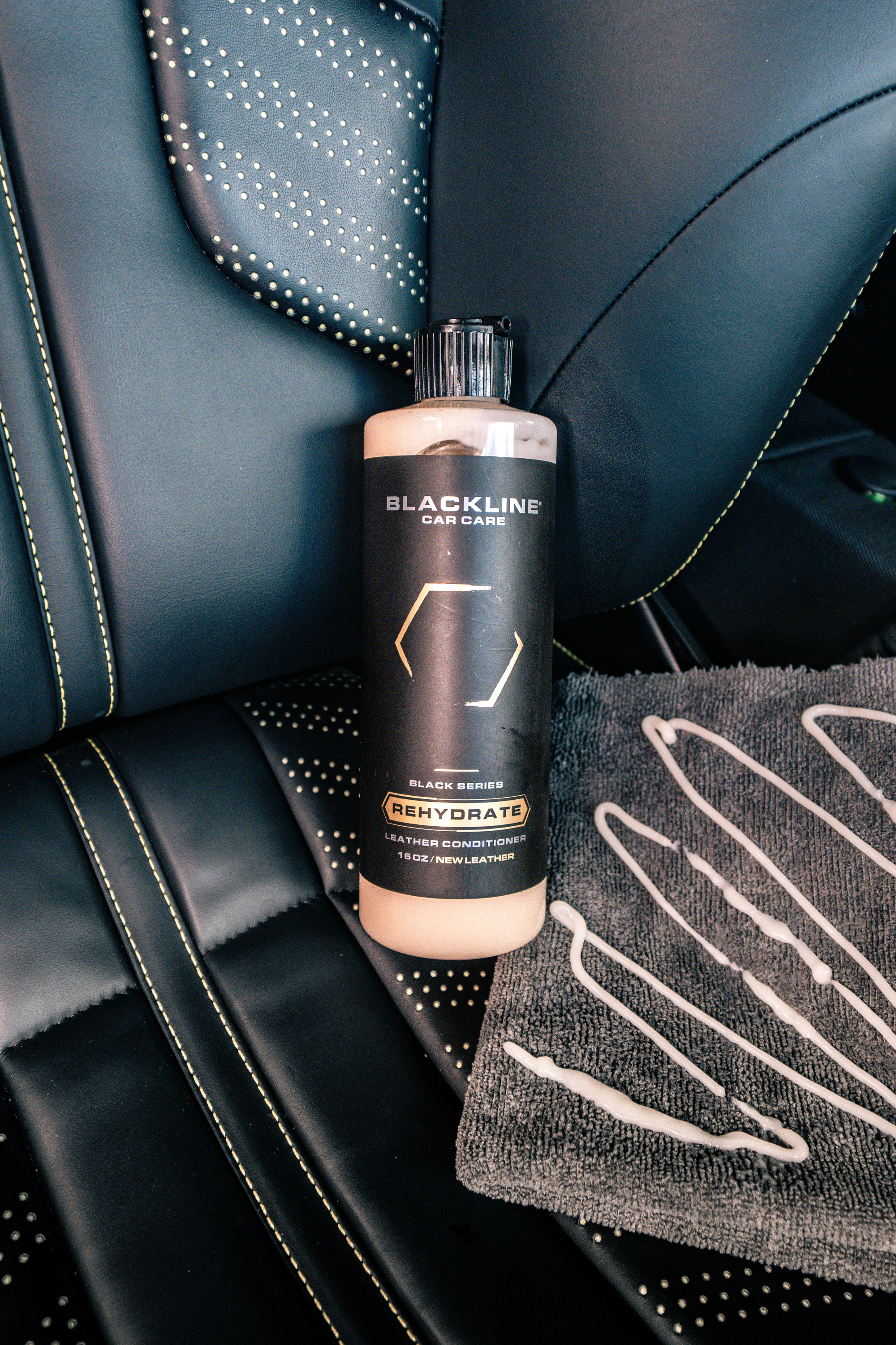Blackline Car Care BLACKLINE® REHYDRATE LEATHER CONDITIONER in use - professional detailing application