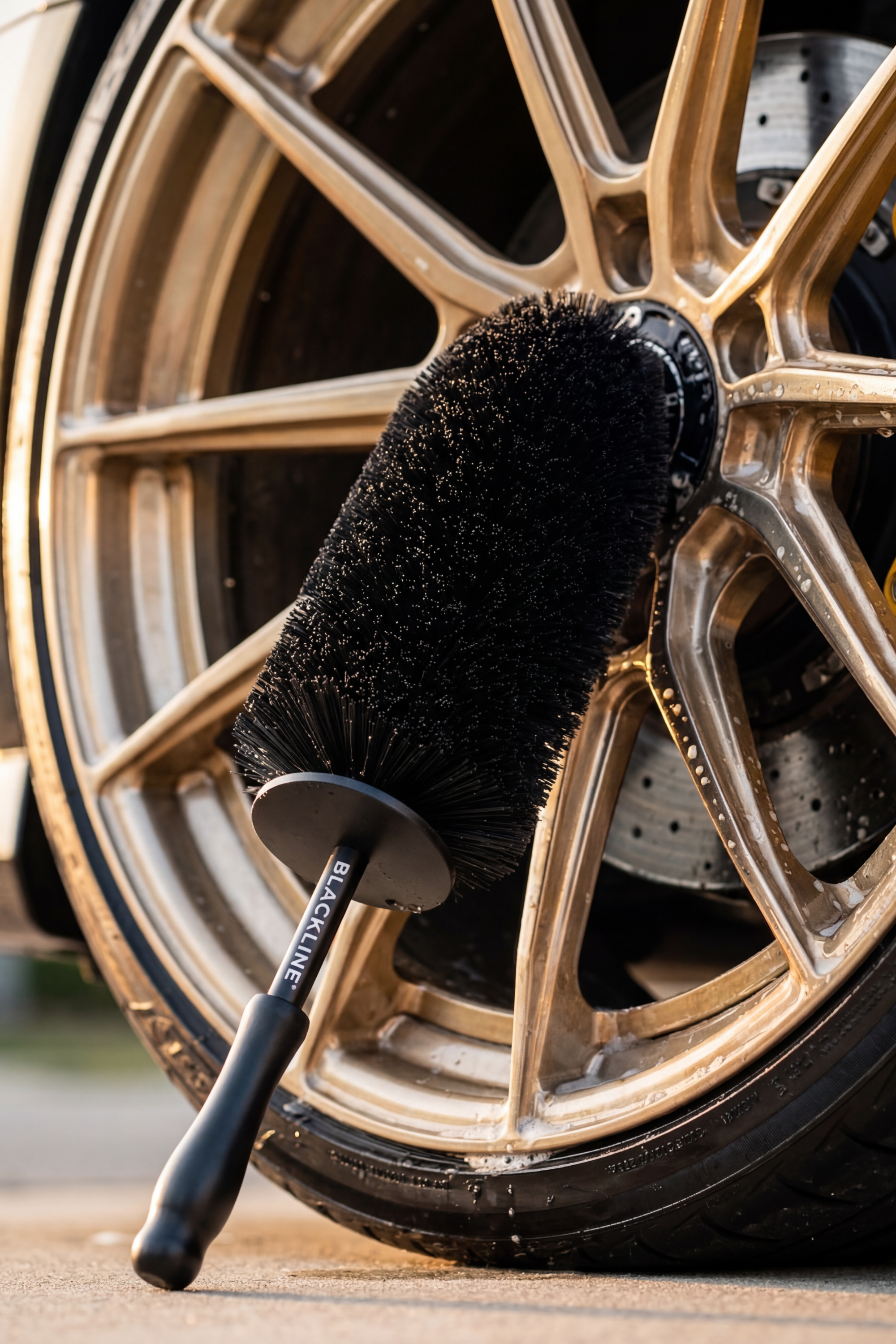 Blackline Car Care BLACKLINE® WHEEL BARREL BRUSH in use - professional detailing application