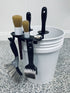Stubby Nozzle Co. BucketCaddy - Wheel, Tire, & Detailing Brush Organizer for 5-gallon and 6-gallon Car Wash Buckets in use - professional detailing application