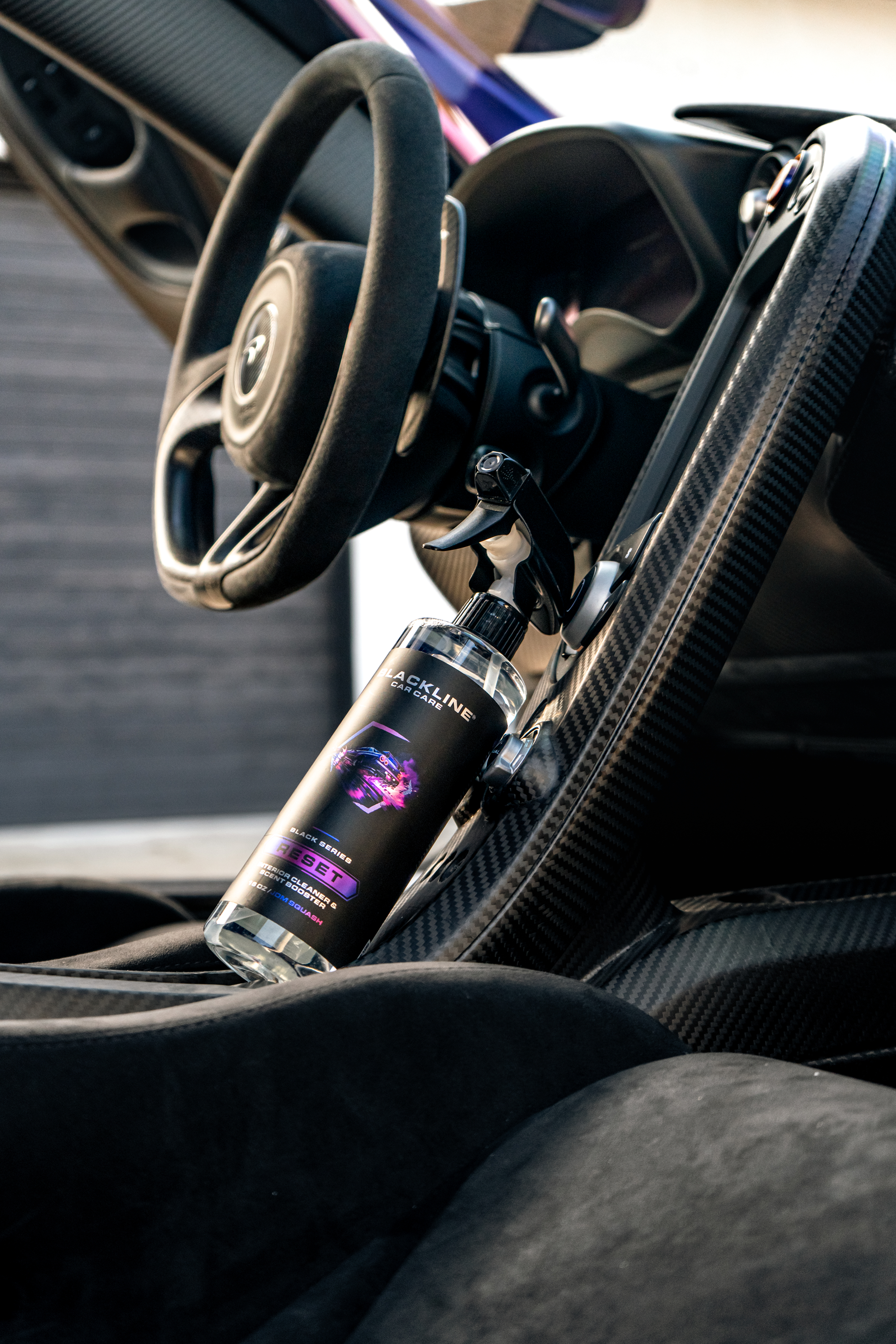 Blackline Car Care BLACKLINE® RESET INTERIOR CLEANER & SCENT BOOSTER in use - professional detailing application