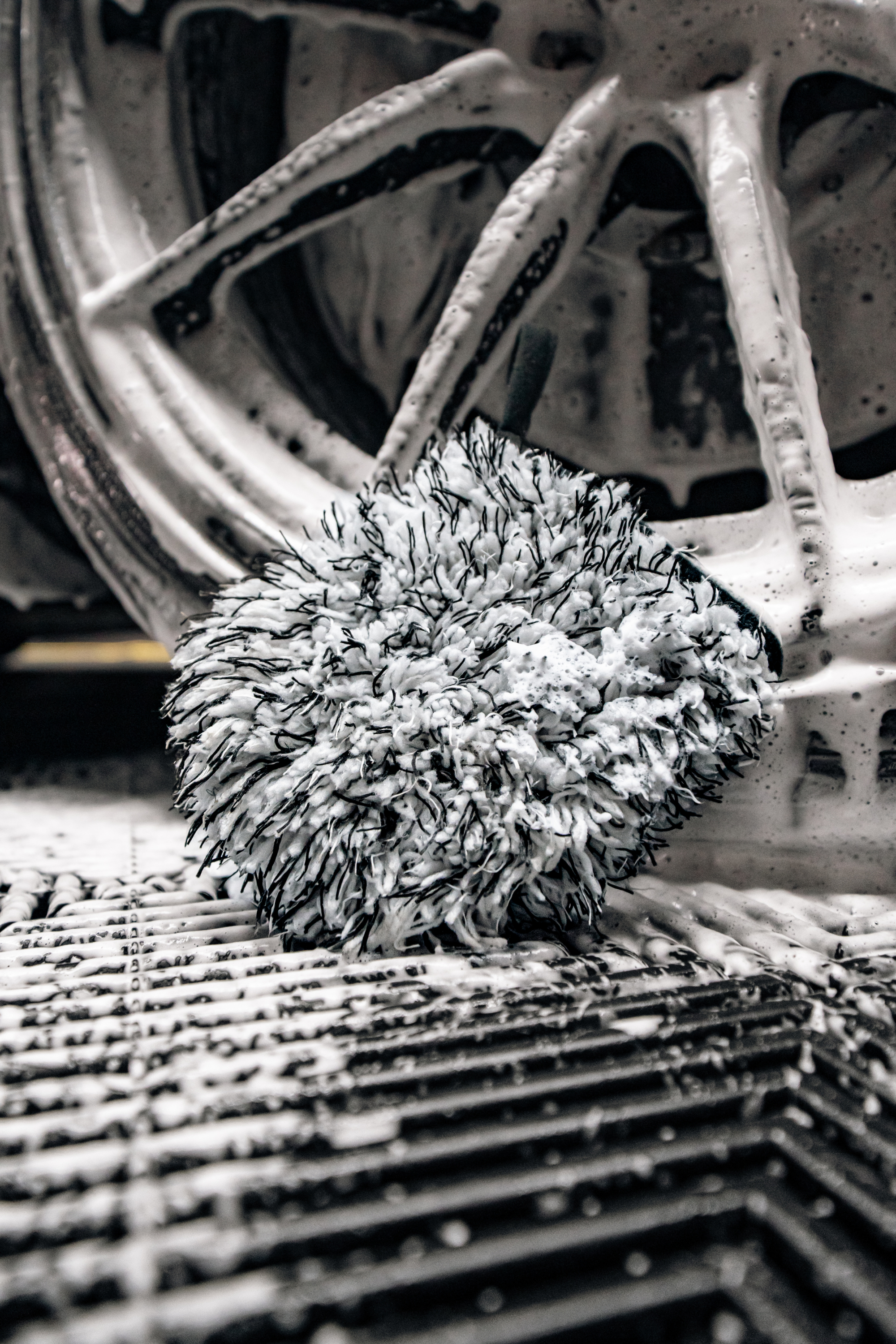 Blackline Car Care BLACKLINE® MICROFIBER WHEEL MITT in use - professional detailing application