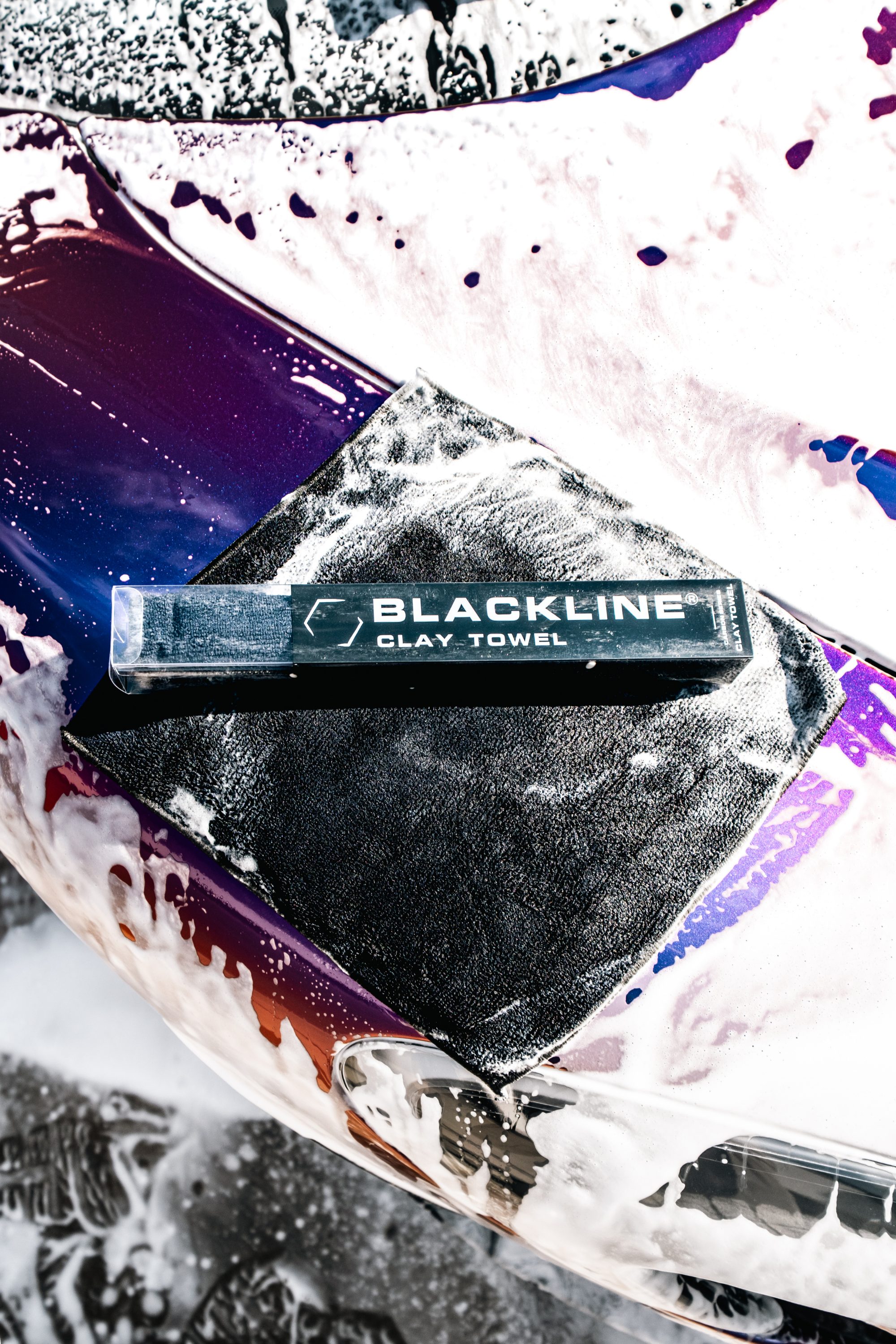 Blackline Car Care BLACKLINE® SYNTHETIC CLAY TOWEL in use - professional detailing application