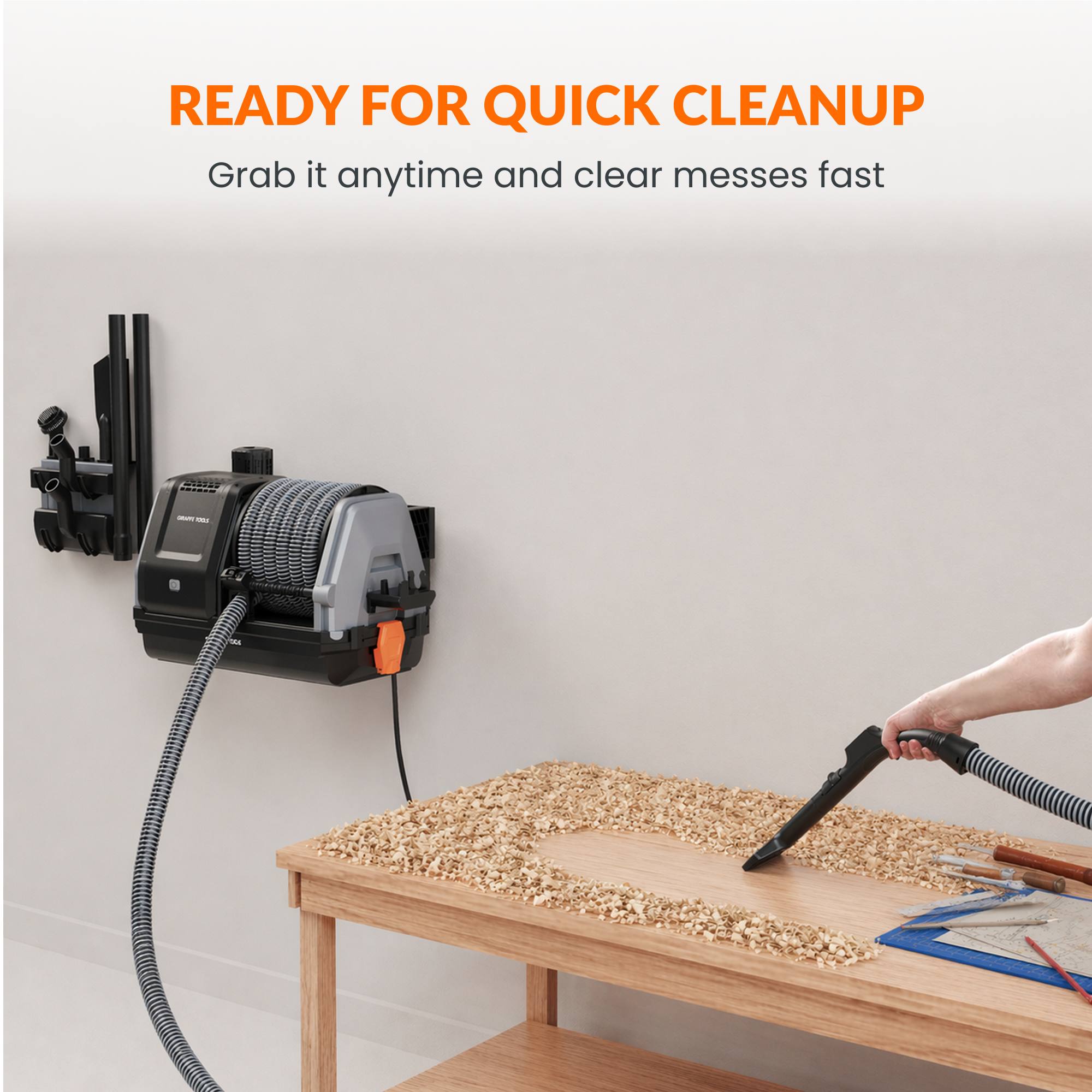 Giraffe Tools Retractable Vacuum Cleaner with 30ft hose. Wall-mounted design, wet & dry use, and auto retraction for effortless garage cleaning.