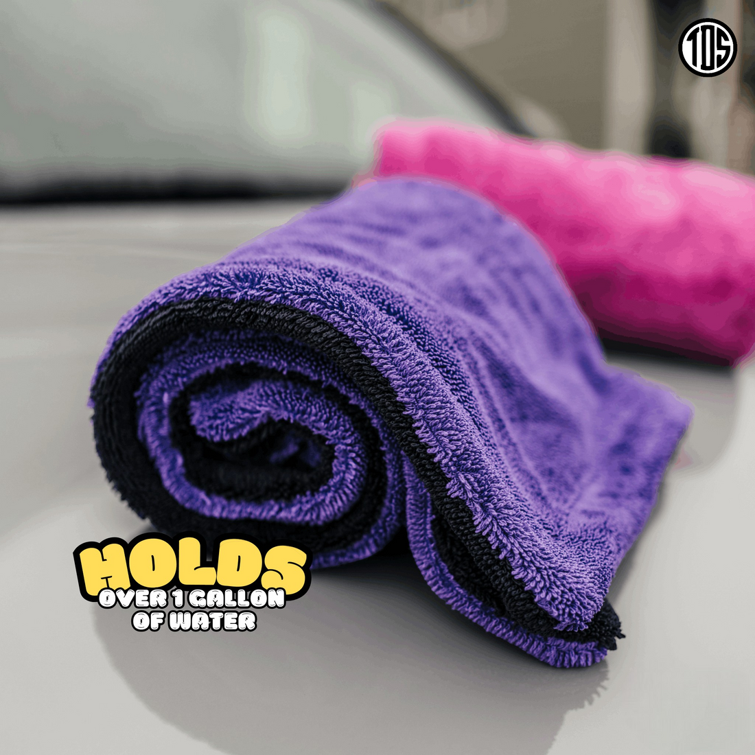 TDS Towel 1600 black and purple 1600 GSM twisted loop microfiber drying towel laid across a car hood
