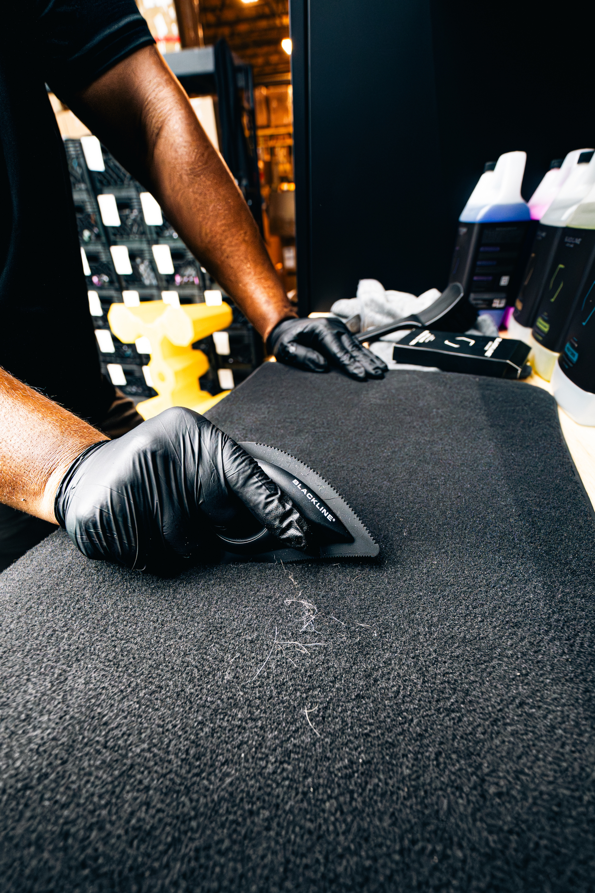 Blackline Car Care BLACKLINE® PET HAIR BRUSH in use - professional detailing application