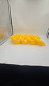 Four yellow Hozeez car wash hose guides arranged side by side