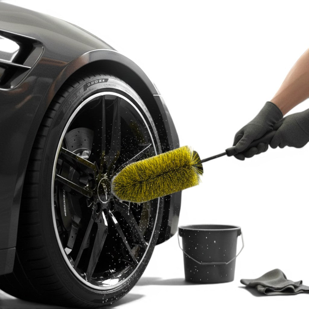 That Detail Shop yellow barrel brush cleaning a black car wheel and tire. Includes bucket and cloth.