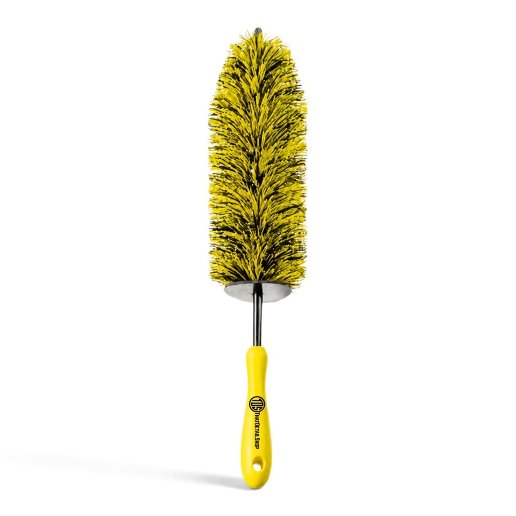 That Detail Shop barrel brush with yellow and black bristles and a yellow ergonomic handle for car detailing