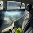 That Detail Shop Bio-Bombs vehicle deodorization kit activating inside a car interior to remove stubborn odors.