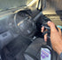 That Detail Shop Bio-Bombs Fresh AF air freshener spray being misted into a clean car interior.