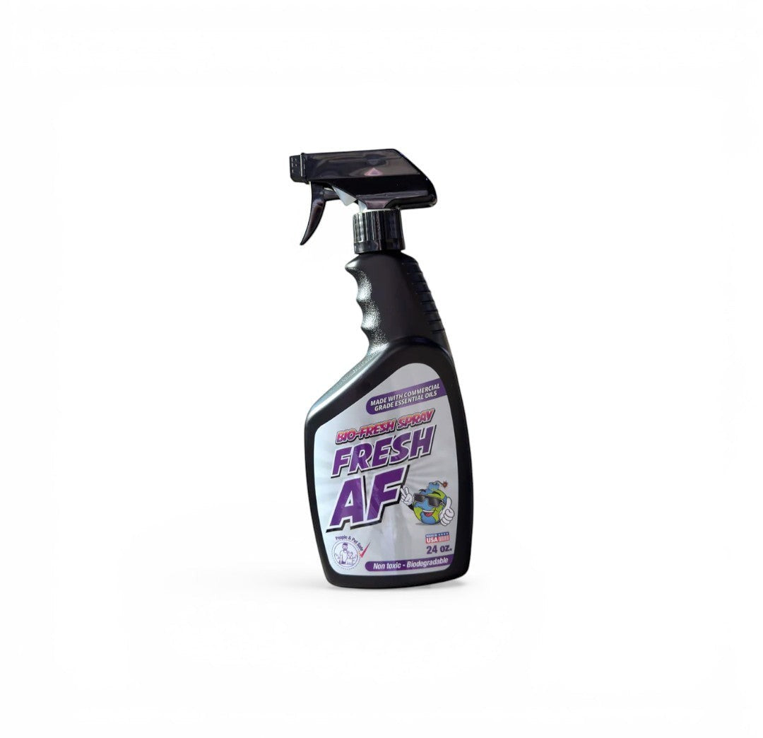 That Detail Shop Bio-Bombs Fresh AF air freshener spray bottle on car seat. Made with commercial grade essential oils.