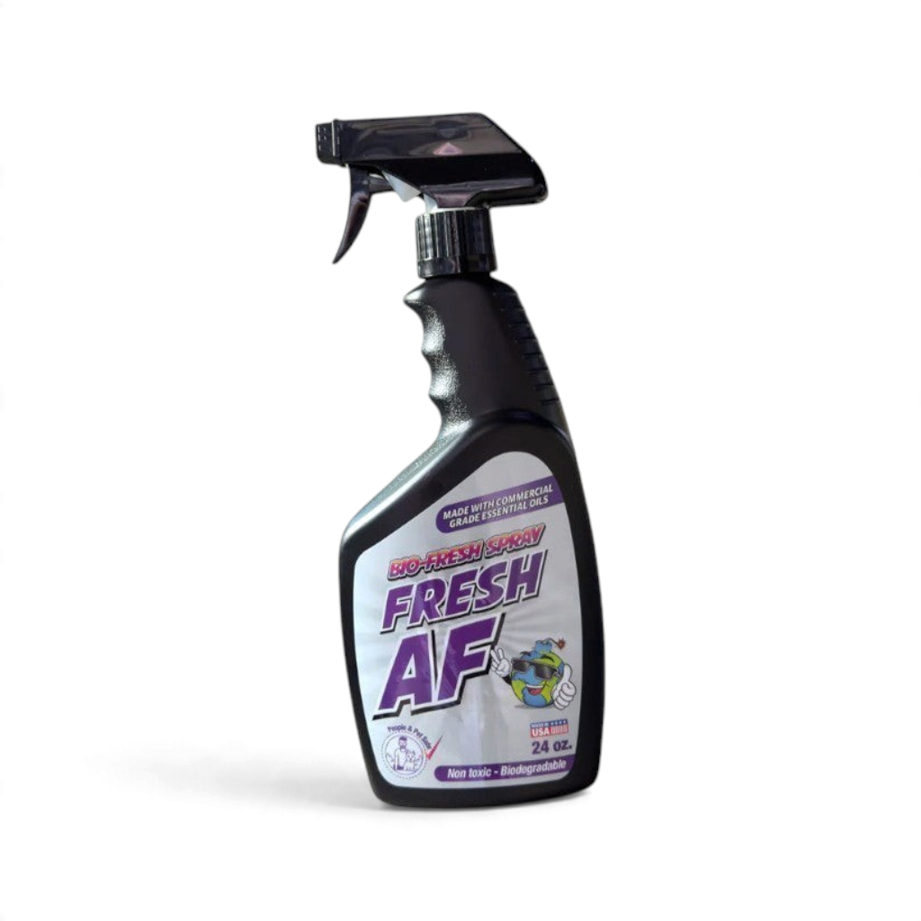 That Detail Shop Bio-Bombs Fresh AF air freshener spray bottle on car seat. Made with commercial grade essential oils.