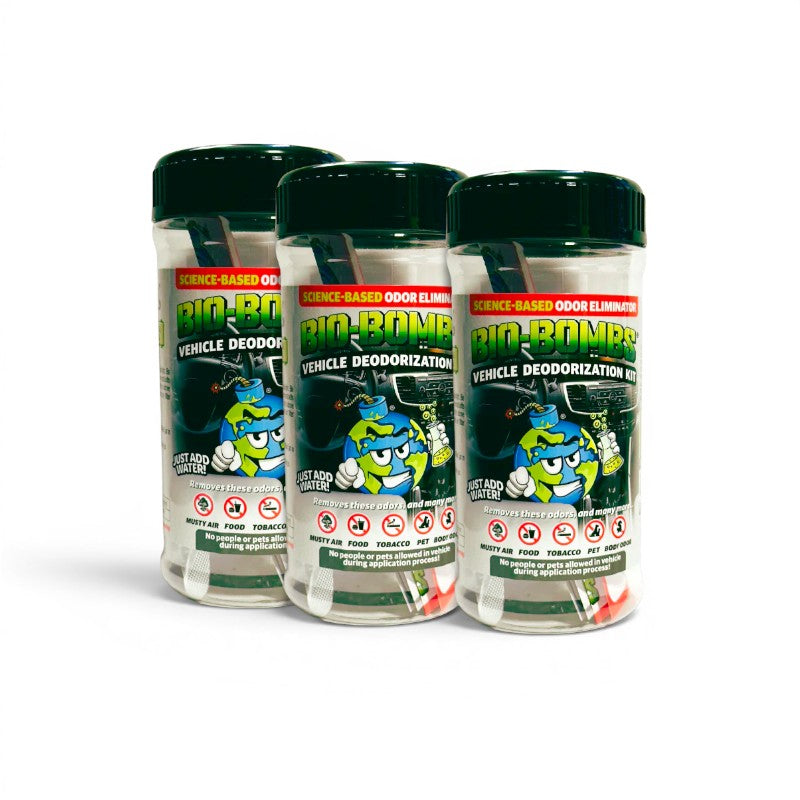 That Detail Shop Bio-Bombs Vehicle Deodorization Kit, 3-pack. Clear canisters with green lids contain odor-eliminating bombs.