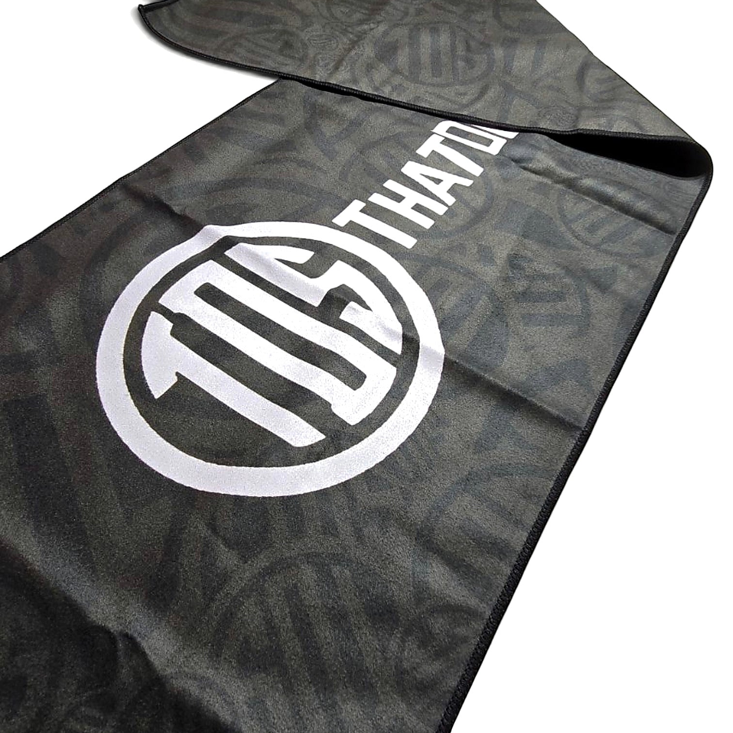 That Detail Shop black heavyweight Cooley cooling towel featuring a white TDS logo and repeating pattern.