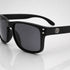 That Detail Shop matte black polarized sunglasses with a classic square frame and subtle TDS logo on the temple.