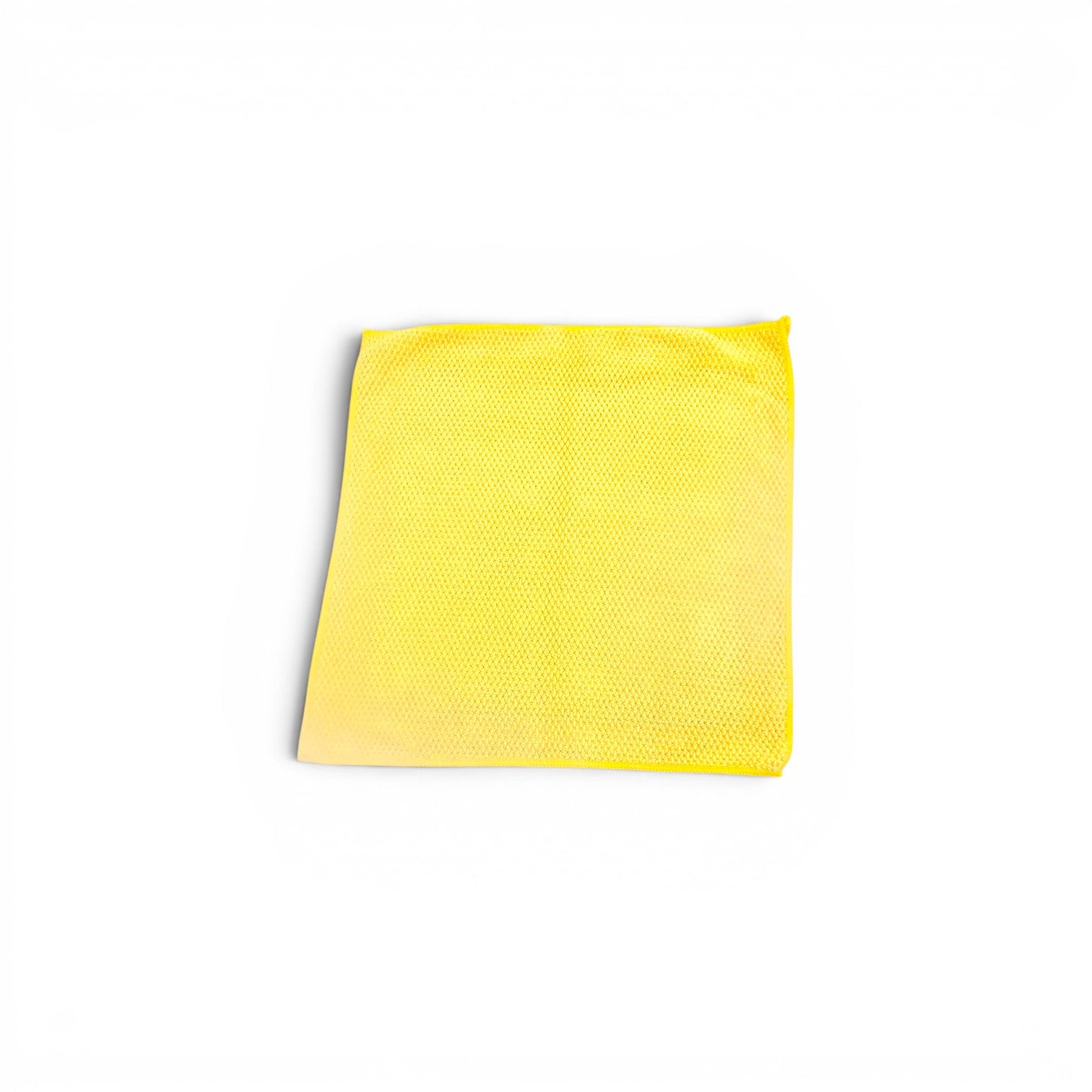 That Detail Shop yellow 12x12 inch clay towel with advanced polymerized rubber surface and microfiber backing for paint decontamination.