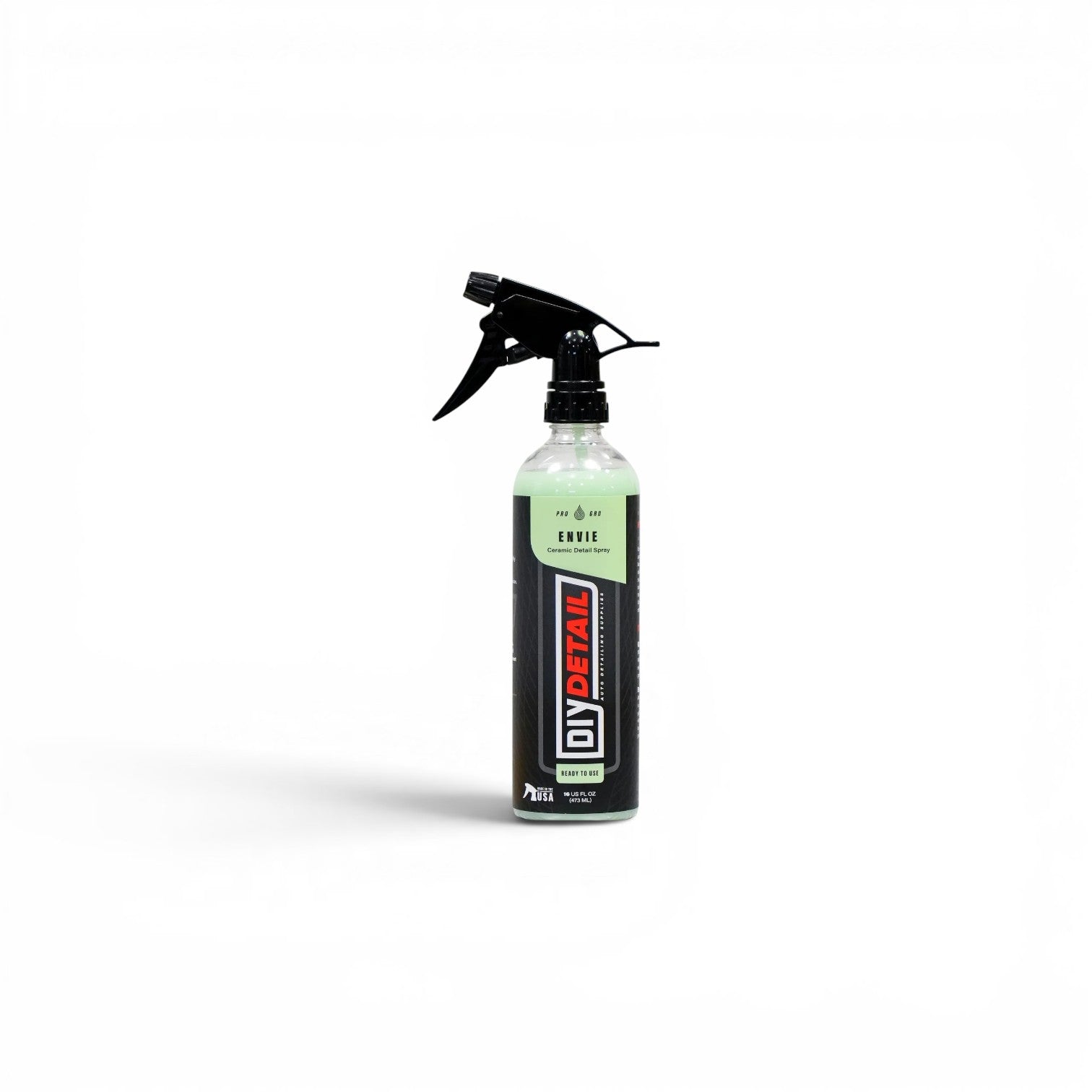 DIY Detail Envie Ceramic Detail Spray 16 oz bottle with black spray nozzle and light green liquid inside. Adds gloss and protection.