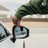 That Detail Shop exterior detailing brush cleaning a car's side mirror with foam.