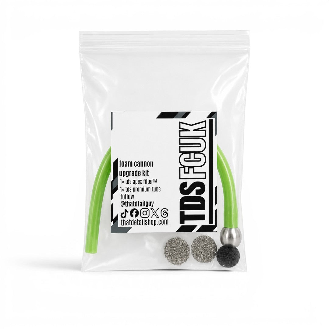 That Detail Shop FCUK foam cannon upgrade kit in a clear plastic bag with green tube, metal filter, and mesh discs.