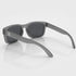 That Detail Shop Frost Gray polarized sunglasses with a square frame and subtle temple logo on a white background.