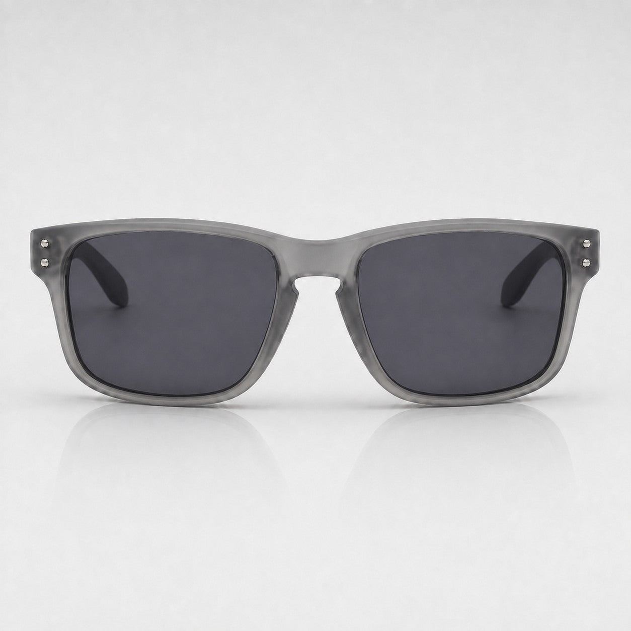 That Detail Shop TDS Sunnys polarized sunglasses in frost gray with a square frame and dark lenses.