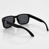 That Detail Shop matte black polarized sunglasses with a classic square frame and subtle TDS logo on the temple.