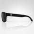 That Detail Shop matte black polarized sunglasses with a square frame and subtle TDS logo on the temple side view