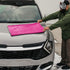 That Detail Shop pink and gray 1400 GSM microfiber drying towel on a car hood