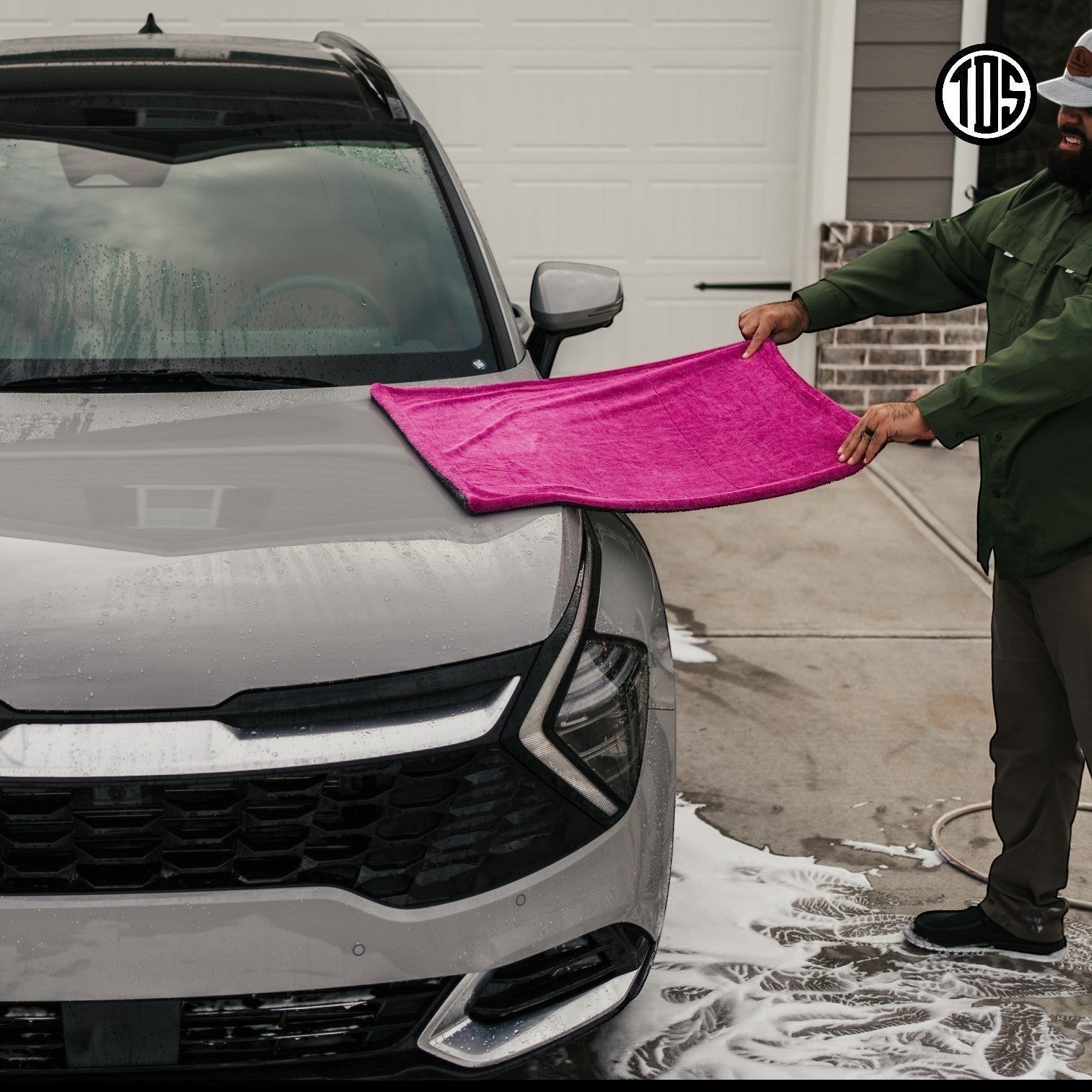 That Detail Shop pink microfiber car drying towel with gray accents, 1400 GSM, 20x30 inches.