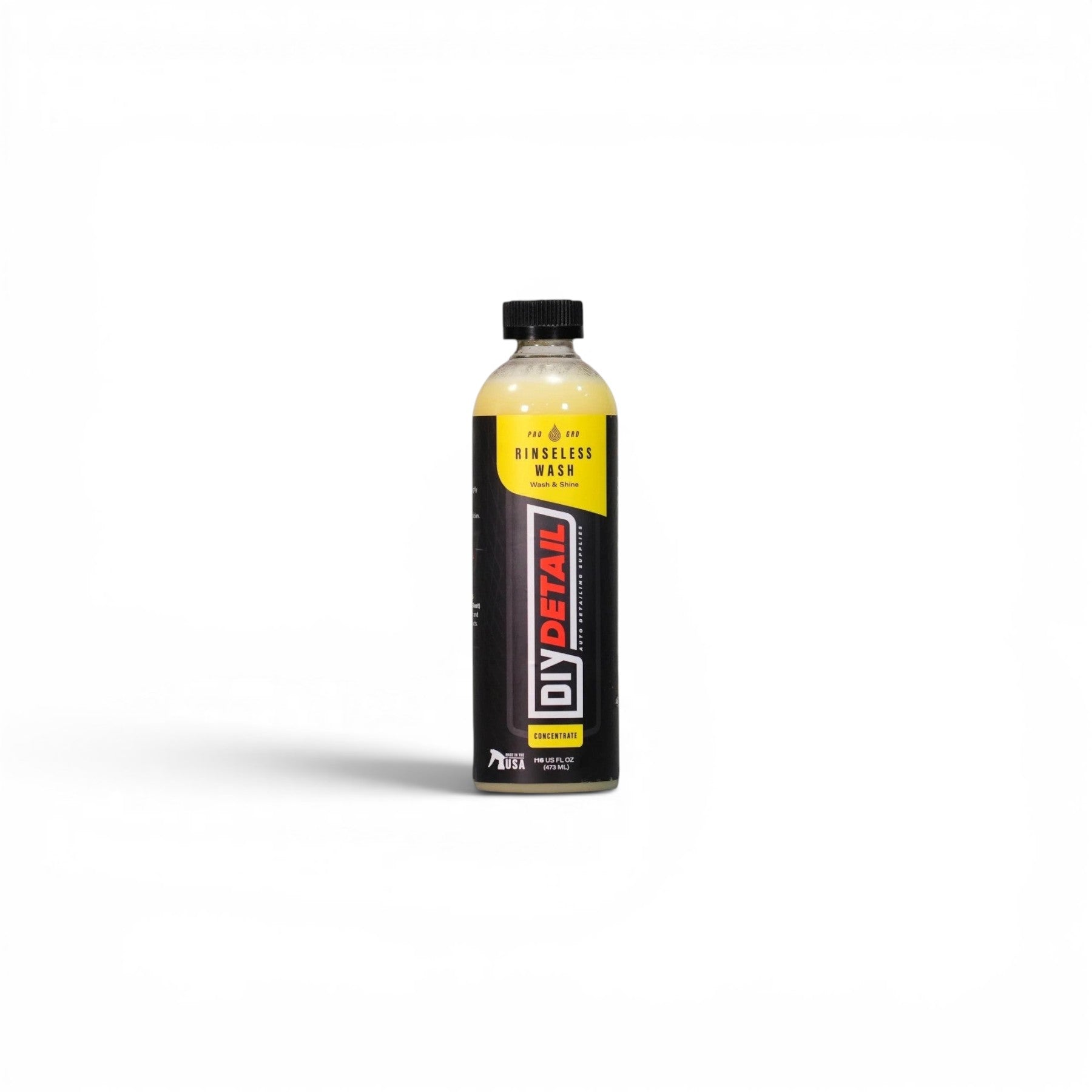 That Detail Shop DIY Detail Rinseless Wash 16 oz concentrate for car cleaning. Yellow and black label.
