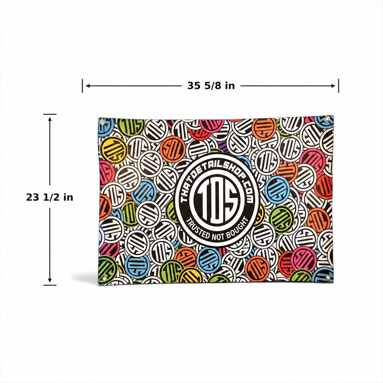That Detail Shop Sticker Bomb PVC banner with multicolor logo pattern and corner grommets for garage or shop display.