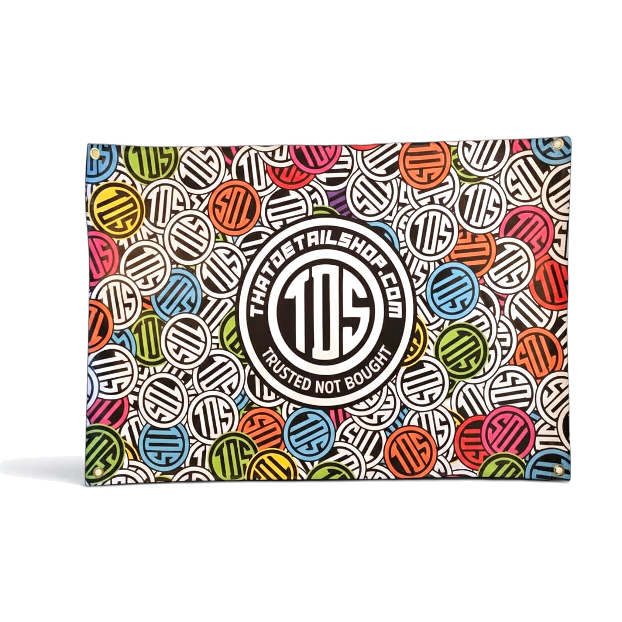 That Detail Shop sticker bomb PVC banner with multicolor logo pattern and center badge for garage or shop display