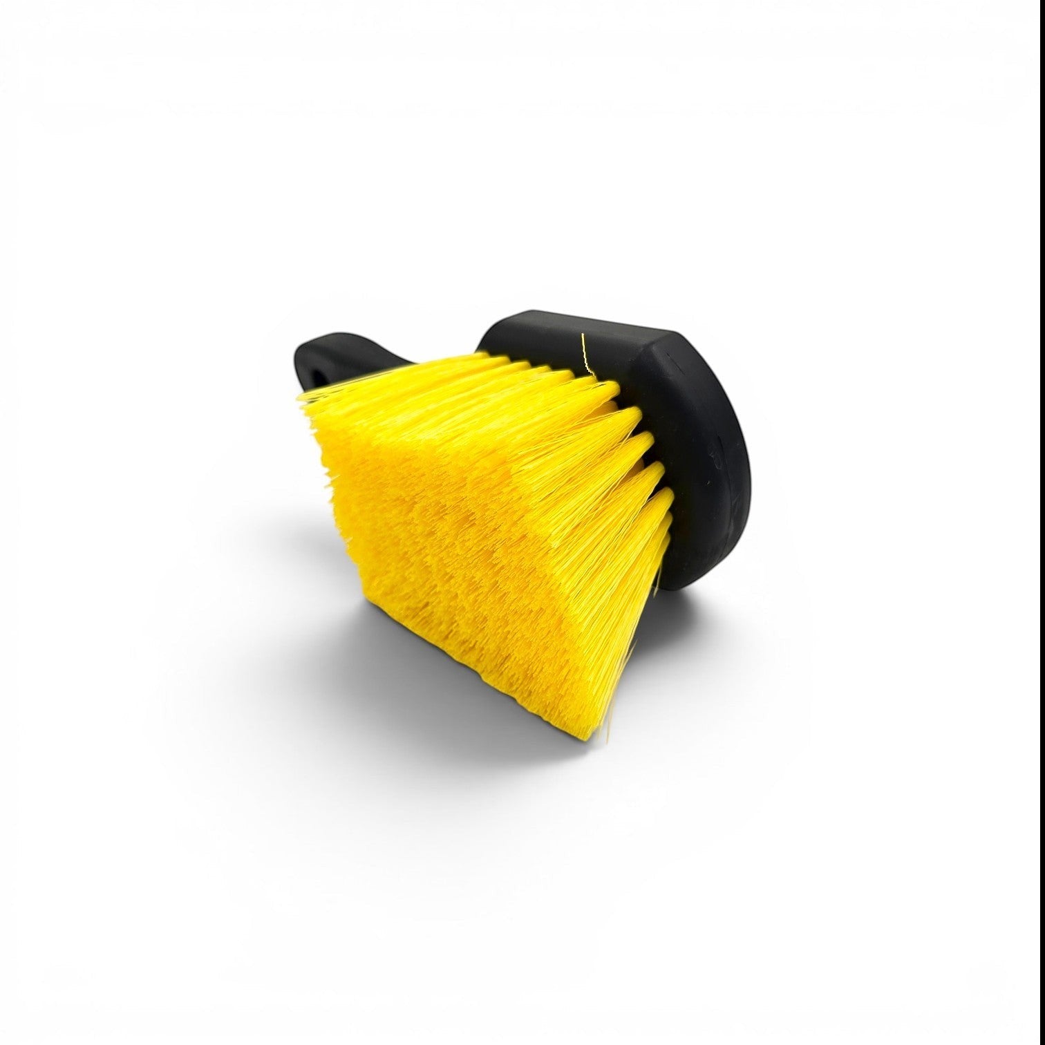 That Detail Shop yellow and black tire brush with durable bristles for cleaning wheels and tires.