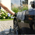That Detail Shop wash mitt, high-pile microfiber, black and white with green accents, used for car washing.