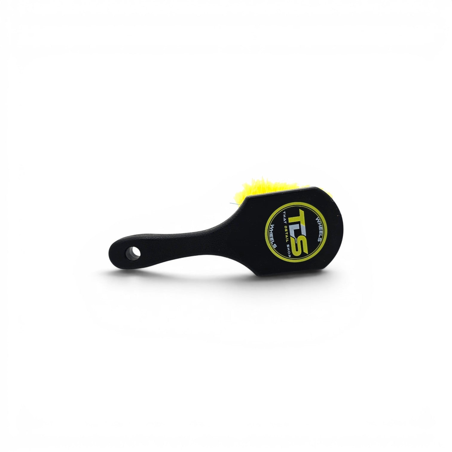 That Detail Shop black wheel brush with yellow bristles and ergonomic handle for cleaning wheels and tires.
