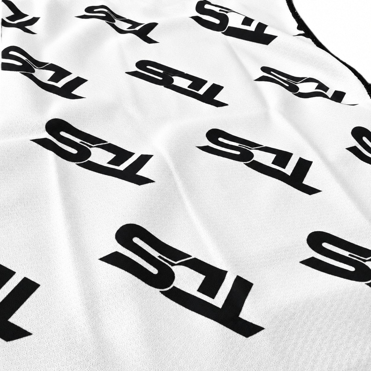 That Detail Shop white lightweight cooling towel featuring a repeating black TDS logo pattern