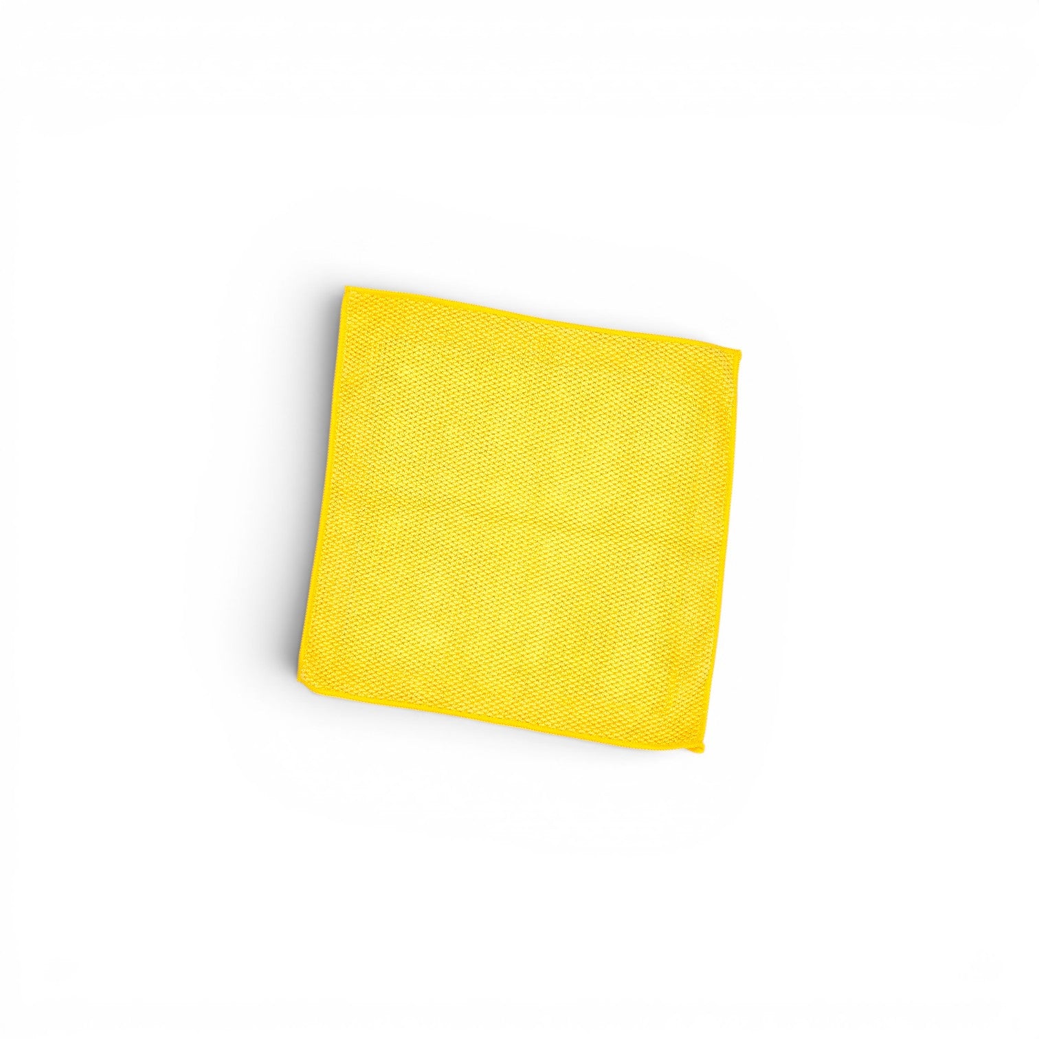 That Detail Shop yellow microfiber clay towel with polymerized rubber surface for paint decontamination.
