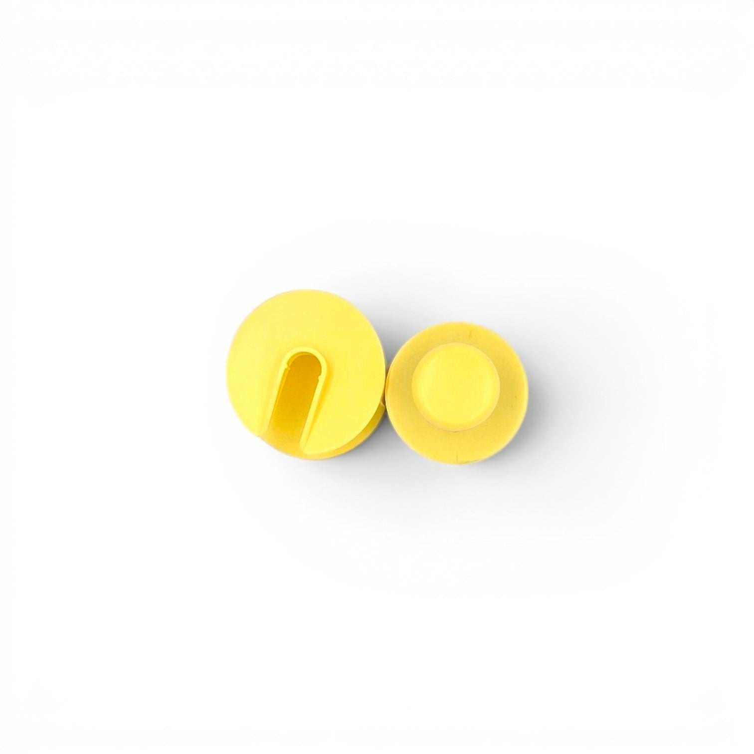 That Detail Shop yellow tire shine applicator with ergonomic handle for cleaning wheels and tires.