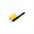 That Detail Shop black and yellow tire brush with stiff bristles and ergonomic handle for cleaning tire sidewalls.