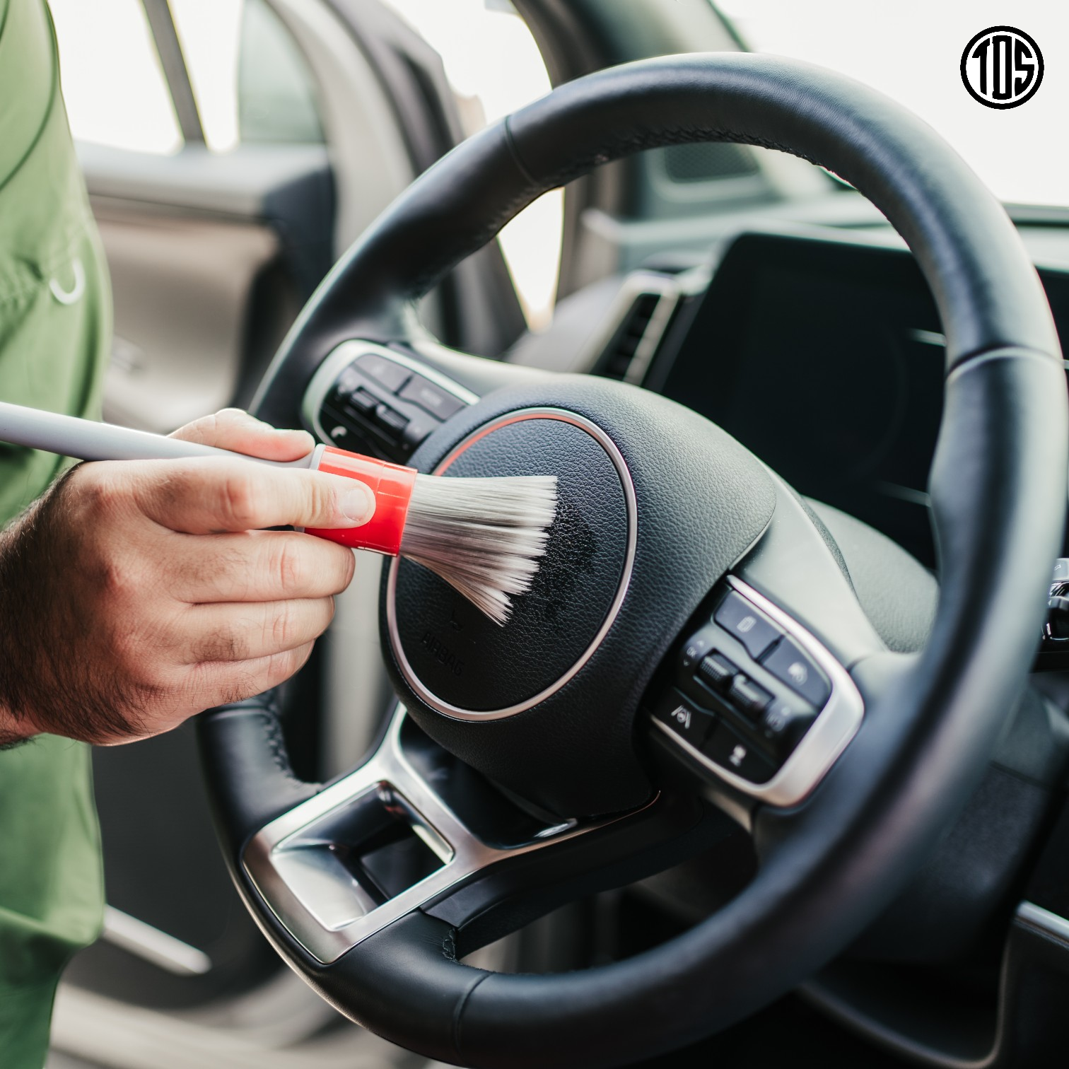That Detail Shop interior detailing brush cleaning car steering wheel crevices. Soft bristles, ergonomic handle.