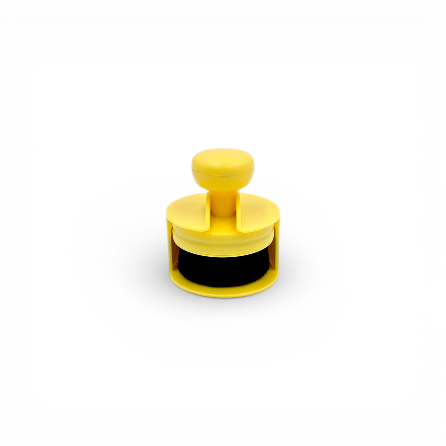 That Detail Shop yellow high-density foam tire shine applicator with black bristles and ergonomic grip for even application.