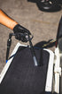 ULTRA Air Swivel in use with a compressed-air tool above a vehicle floor mat.